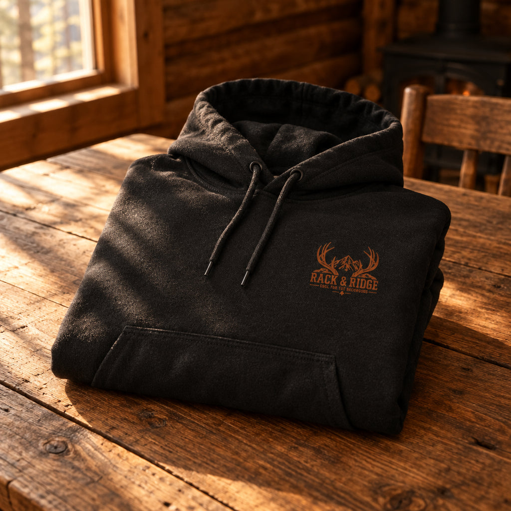 Black hoodie with a small logo on the chest 