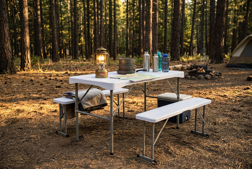 White folding table with two benches