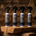 Four spray bottles of Pure Whitetail White Lightener arranged in a row